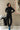 Legging thermique Chris noir porté avec le body col roulé Maxime noir, prete pour le ski– yvo et moi