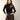 Sous-pull col montant Pierre noir en mérinos et soie, une manche en tulle, porté avec un jean marron – yvo et moi
